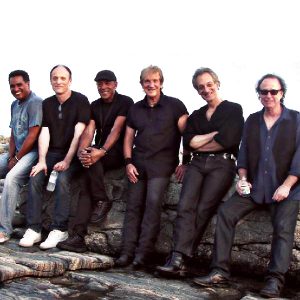 The Beaver Brown Band 2015 (left to right): Jackie Santos, Dean Cassell, Michael "Tunes" Antunes, John Cafferty, Gary "Guitar" Gramolini & Steve Burke