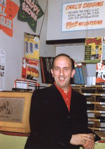 Carl Henry at the first location of his Carl's Diggins record shop adjacent to The Celebrity Club. (Schiavone/Henry Family Archive)